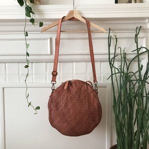 large woven leather circle bag